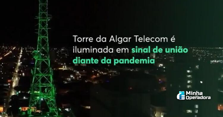 Torre da Algar Telecom iluminada na cor verde